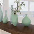 Light Green Vases With Various Shapes And Plants On Wooden Table By Bright Window