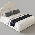 Modern Double Bed With Upholstered Headboard White Bedspread Gray Pillows And Black Striped Blanket