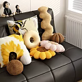 Colorful Decorative Pillows with Sunflower Bee Patterns and Various Shapes on Black Sofa