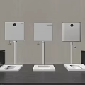 Three White Toilets With Wall Mounted Cisterns Black Trash Bins Against Gray Wall Dark Floor