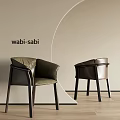 Wabi Sabi Style Dining Chairs With Leather Upholstery And Dark Wooden Frames