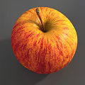 Fresh Juicy Red and Yellow Apple with Stem on Gray Background Close Up