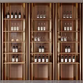 Luxurious Gold Wine Cabinet With Multi Tiered Shelves And Wine Bottles Glasses