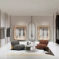 Modern Clothing Store Interior Design With Clothing Racks Display Shelves And Seating Area