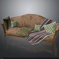Brown Sofa With Various Patterned Pillows And Striped Blanket On Wooden Armrests