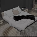 Modern Minimalist Double Bed Interior With White Quilt Black Blanket Nightstand And Patterned Rug