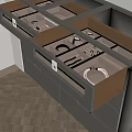White Cabinet With Open Drawers And Divided Storage For Utensils On Herringbone Floor