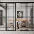 Modern Sliding Doors Interior Design With Black Frames Textured Glass And Dining Area