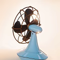 Vintage Electric Fan With Blue Base Black Blades And Metal Grille Design