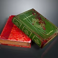 Carved Book Covers With Red And Green Designs Featuring Decorative Patterns And Titles