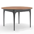 Sleek Modern Round Dining Table With Wooden Tabletop And Black Legs