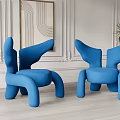 Blue Single Sofa With Unique Wing Shaped Design In Modern Interior Setting 3d model