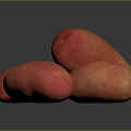 Four Fresh Red Potatoes With Small Spots On Black Smooth Surface Showing Reflections