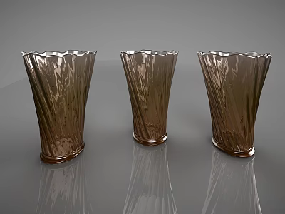 Three Brown Decorative Vases with Textured Surface and Glossy Finish on Smooth Gray Surface 3d model