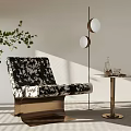 Stylish Black White Patterned Lounge Chair With Round Side Table Gold Floor Lamp Green Plant