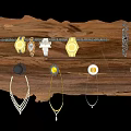Stylish Jewelry Collection Displayed On Wooden Rack With Watches Bracelets Necklaces And Brooches