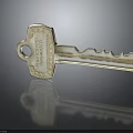 Metallic Key With Engraved Chateau Thierry Text And Shiny Detailed Surface