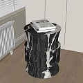 Black And White Marble Side Table With Cylindrical Design And Books On Wooden Floor