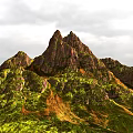 Scenic Mountain Landscape With Rocky Peaks And Lush Green Vegetation