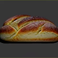 Freshly Baked Round Bread With Golden Red Crust And Shiny Surface