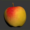 Fresh Red and Yellow Apple on Dark Shiny Surface with Reflection