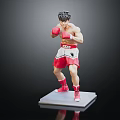 Male Boxer Figurine in Action Posing Stance With Red Gloves Shorts On Gray Base Stand