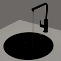 Round Black Kitchen Sink With Modern Faucet Running Water On Gray Countertop
