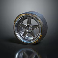 Tire with Star Shaped Silver Wheel and Side Yellow Flames on Dark Background with Reflection