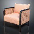 Modern Peach Armchair with Black Frame and Perforated Dot Pattern on Armrest and Backrest