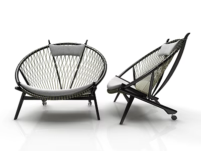 Two Modern Leisure Chairs With Black Frame Woven Structure And Gray Cushions 3d model