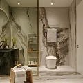 Luxurious Bathroom Interior With Marble Vanity Round Backlit Mirror Green Tiles And Gold Fixtures