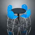 Black Round Dining Table With Four Blue Chairs And Metal Frames