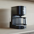 Black Xiaomi Coffee Machine With Glass Carafe On Modern Kitchen Countertop