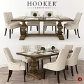 Elegant Wooden Dining Table And Upholstered Chairs With Green Plants And Wine Glasses
