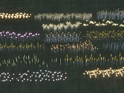Illuminated Inflatable Decorations in Various Colors Arranged in Patterns on Grassland 3d model