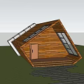 Slanted Wooden House With Solar Panels On Roof And Front Steps Pathway