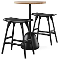Modern Black Bar Stools With Sturdy Legs And Comfortable Seats Next To Bar Counter