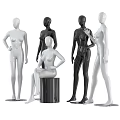Multiple White And Black Mannequins In Standing And Sitting Poses