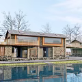 Rustic Scenic Homestay Building with Stone Wooden Structure Waterfront View and Green Trees