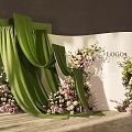 Wedding Backdrop Setup With Green Curtains And Flower Decorations On White Backdrop With LOGO