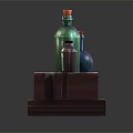 Green Blue Brown Wine Bottles and Glasses on Wooden Table With Purple Yellow Striped Cloth