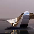 Modern Silver Wavy Sculpture with Glossy Surface and Water Reflection
