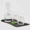 Textured Clear Glass Cups On Wooden Tray With Glass Carafe And Mint Leaf