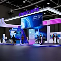 ENSCAPE Exhibition Booth Modern Design With Large Screen Colorful Lighting And Visitors At Tech Event