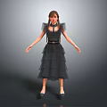 Woman Wearing Black Layered Dress With Sheer Sleeves Standing Arms Outstretched On Gray Background
