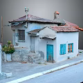 Traditional Village House With Red Tile Roof White Walls Blue Door Windows And Stone Steps