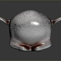 Gray Monkey Head Sculpture With Large Eyes Prominent Nose And Ears