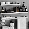 Luxury Bath Towels On Bathroom Shelves With Folded Towels Hanging Hooks And Toiletries