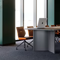 Modern Conference Room With Dark Green Walls Large Windows And Orange Chairs