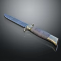 Vintage Metal Blade Knife With Wooden Handle And Brass Accents On Dark Background